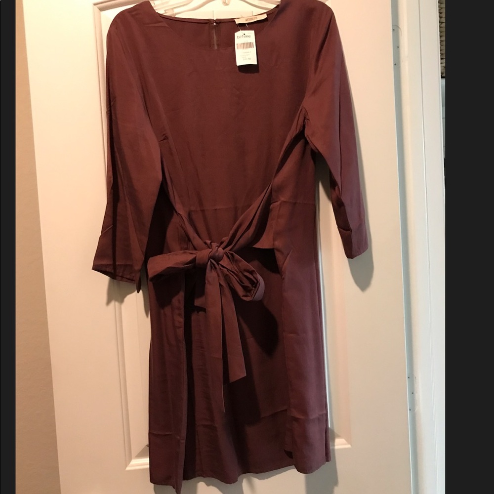 Burgundy shift dress.